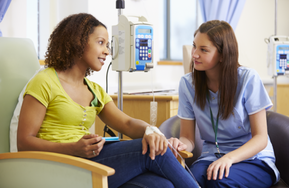Patient and nurse in hospital