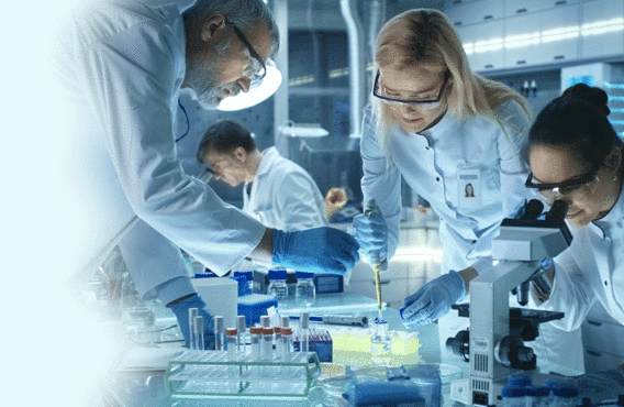 Four researchers working in a lab
