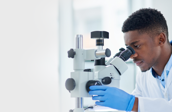 Doctor using a microscope