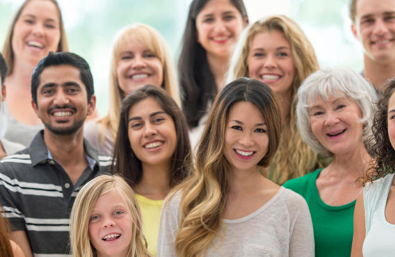 A group of people smiling for a photo