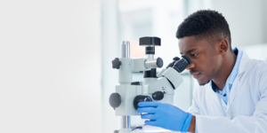 Doctor using a microscope