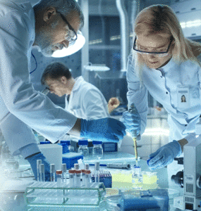 Four researchers working in a lab
