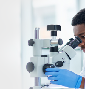 Doctor using a microscope