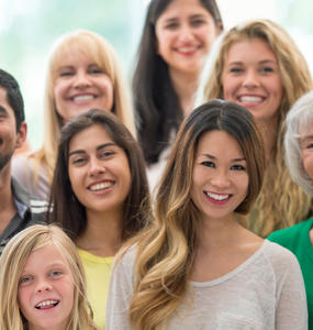 A group of people smiling for a photo