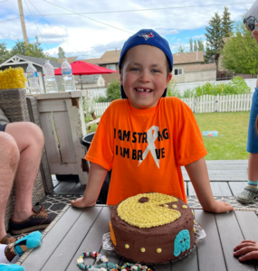 Ezra with a birthday cake