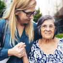 Mother and daughter holding hands