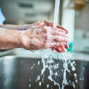 Person washing their hands