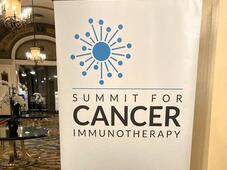 &quot;Summit for cancer immunotherapy #Summit4CI&quot; sign
