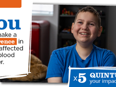 A picture of Ollie smiling while sitting in his bed room. The following is overlayed: &quot;You can make a difference in a life affected by a blood cancer. Quintuple your impact today!&quot;
