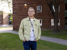 Tom Wong outside of an apartment building in Toronto